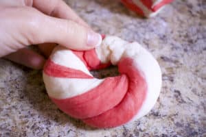 finished red and white bagel dough form